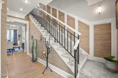 Experience beachfront living like no other at this