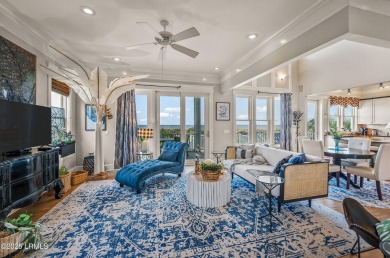 Experience beachfront living like no other at this