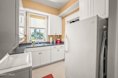 Experience beachfront living like no other at this