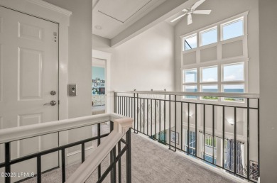 Experience beachfront living like no other at this