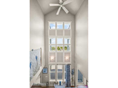 Experience beachfront living like no other at this