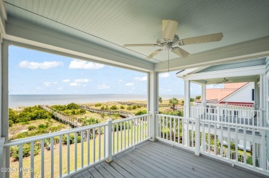 Experience beachfront living like no other at this