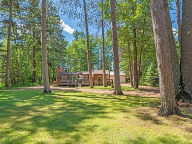 Conveniently located just 1/2 mile from downtown Minocqua, this - photo 1