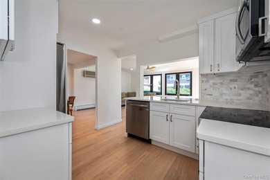 Welcome to this beautifully updated expanded split nestled in - photo 4