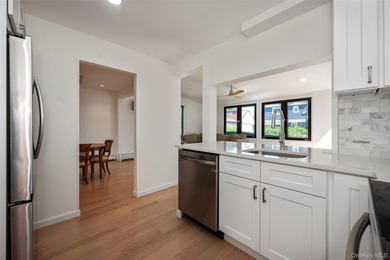 Welcome to this beautifully updated expanded split nestled in - photo 5