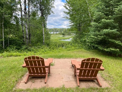 Fantastic log-sided year-round cottage tucked away on 24 private - photo 2