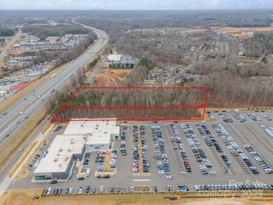 2.85 and 1.26 acre site on HWY 77 near the new Jeep Dealership - photo 3