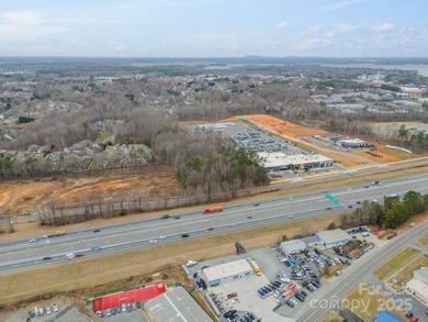 2.85 and 1.26 acre site on HWY 77 near the new Jeep Dealership - photo 5