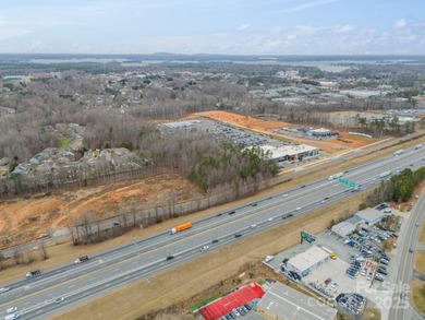 2.85 and 1.26 acre site on HWY 77 near the new Jeep Dealership - photo 6