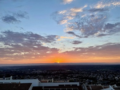Tucked into the gated enclave of Del Cerro Heights, this fully - photo 2