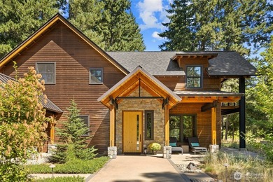 Escape to a refined mountain retreat in the private community of - photo 2