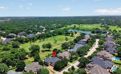 Perched along the scenic greens of Bridlewood, this spectacular - photo 2