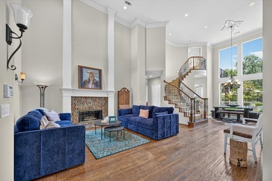 Perched along the scenic greens of Bridlewood, this spectacular - photo 4