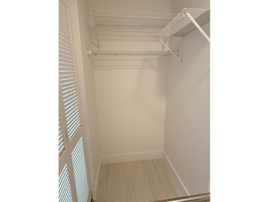 UPDATED 2ND FLOOR CONDO FEATURING WHITE EAT-IN KITCHEN WITH NEW - photo 11
