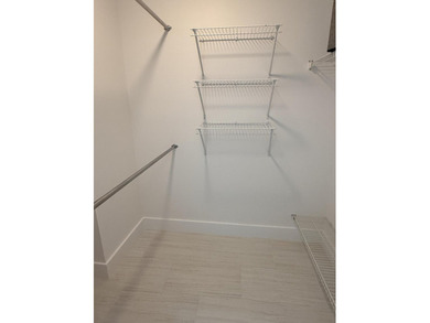 UPDATED 2ND FLOOR CONDO FEATURING WHITE EAT-IN KITCHEN WITH NEW - photo 12