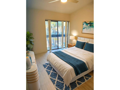 UPDATED 2ND FLOOR CONDO FEATURING WHITE EAT-IN KITCHEN WITH NEW - photo 13