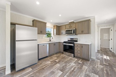 Welcome to easy, worry-free living in this brand-new 2-bedroom - photo 14