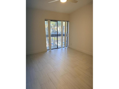 UPDATED 2ND FLOOR CONDO FEATURING WHITE EAT-IN KITCHEN WITH NEW - photo 14