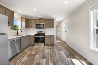 Welcome to easy, worry-free living in this brand-new 2-bedroom - photo 15