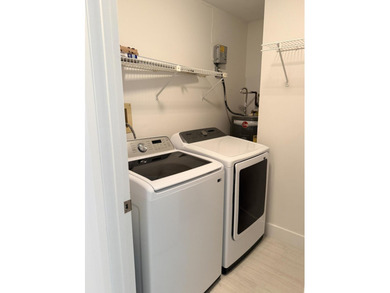 UPDATED 2ND FLOOR CONDO FEATURING WHITE EAT-IN KITCHEN WITH NEW - photo 16