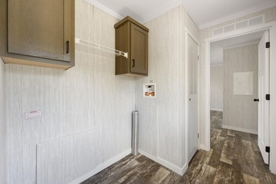 Welcome to easy, worry-free living in this brand-new 2-bedroom - photo 17
