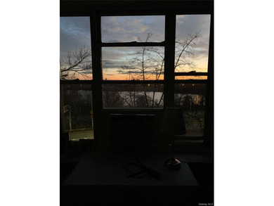 Welcome to this charming, sun-filled alcove studio in the - photo 21