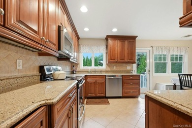 Welcome to 11 Cliftwood Drive, located in one of Huntington's - photo 10