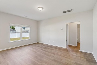 The Magnolia plan by Smith Family Homes is under construction in - photo 11