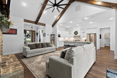 This fully custom, full-brick home sits on just under an acre in - photo 11