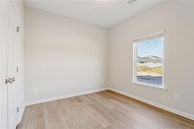 The Magnolia plan by Smith Family Homes is under construction in - photo 13