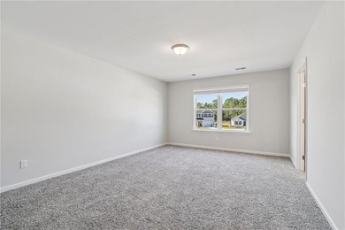 The Magnolia plan by Smith Family Homes is under construction in - photo 21