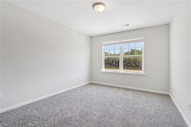 The Magnolia plan by Smith Family Homes is under construction in - photo 29