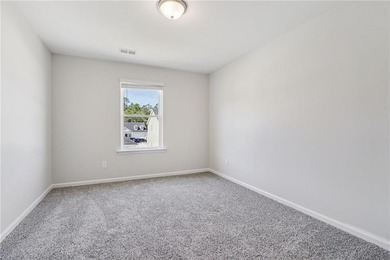 The Magnolia plan by Smith Family Homes is under construction in - photo 31