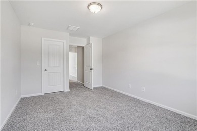 The Magnolia plan by Smith Family Homes is under construction in - photo 32