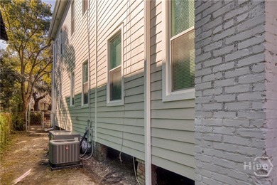 Exceptional opportunity to own a fully renovated duplex in - photo 32