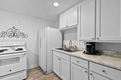 This fully custom, full-brick home sits on just under an acre in - photo 34