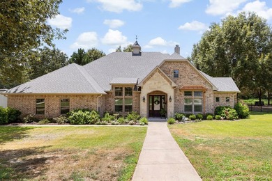 This fully custom, full-brick home sits on just under an acre in - photo 36
