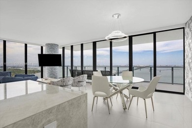 Welcome to One Paraiso #3306, a private elevatored 3 bed, 3.5