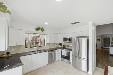 Discover this two-bedroom, two-bath end unit in Quail Meadows at - photo 12