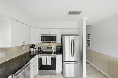 Discover this two-bedroom, two-bath end unit in Quail Meadows at - photo 14