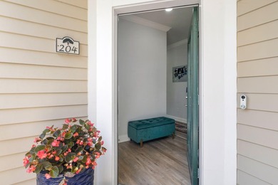This completely renovated 3-bedroom, 3-bath, corner-unit - photo 4