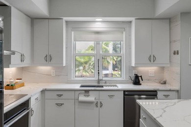 This completely renovated 3-bedroom, 3-bath, corner-unit - photo 5