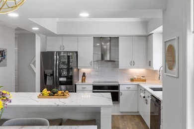 This completely renovated 3-bedroom, 3-bath, corner-unit - photo 7