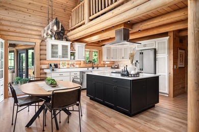 This custom log home was professionally designed and built in - photo 11