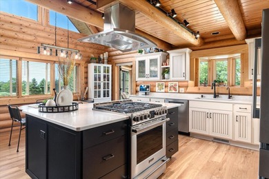 This custom log home was professionally designed and built in - photo 13