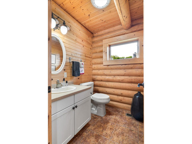 This custom log home was professionally designed and built in - photo 14
