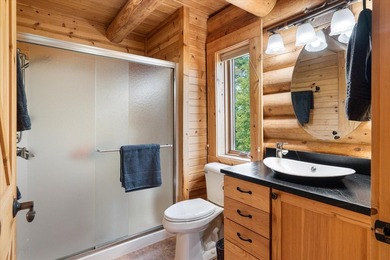 This custom log home was professionally designed and built in - photo 16