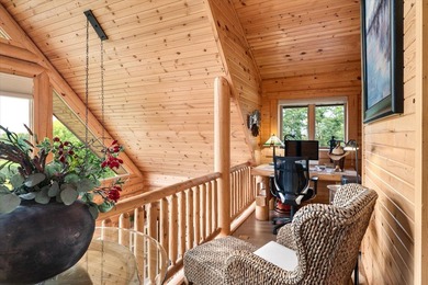 This custom log home was professionally designed and built in - photo 18