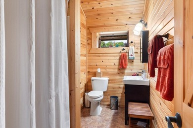 This custom log home was professionally designed and built in - photo 20