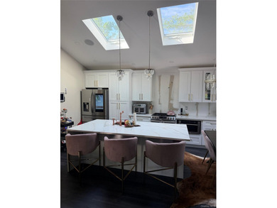 Beautiful corner lot 4 bedroom, 2 full bathroom home featuring a - photo 3
